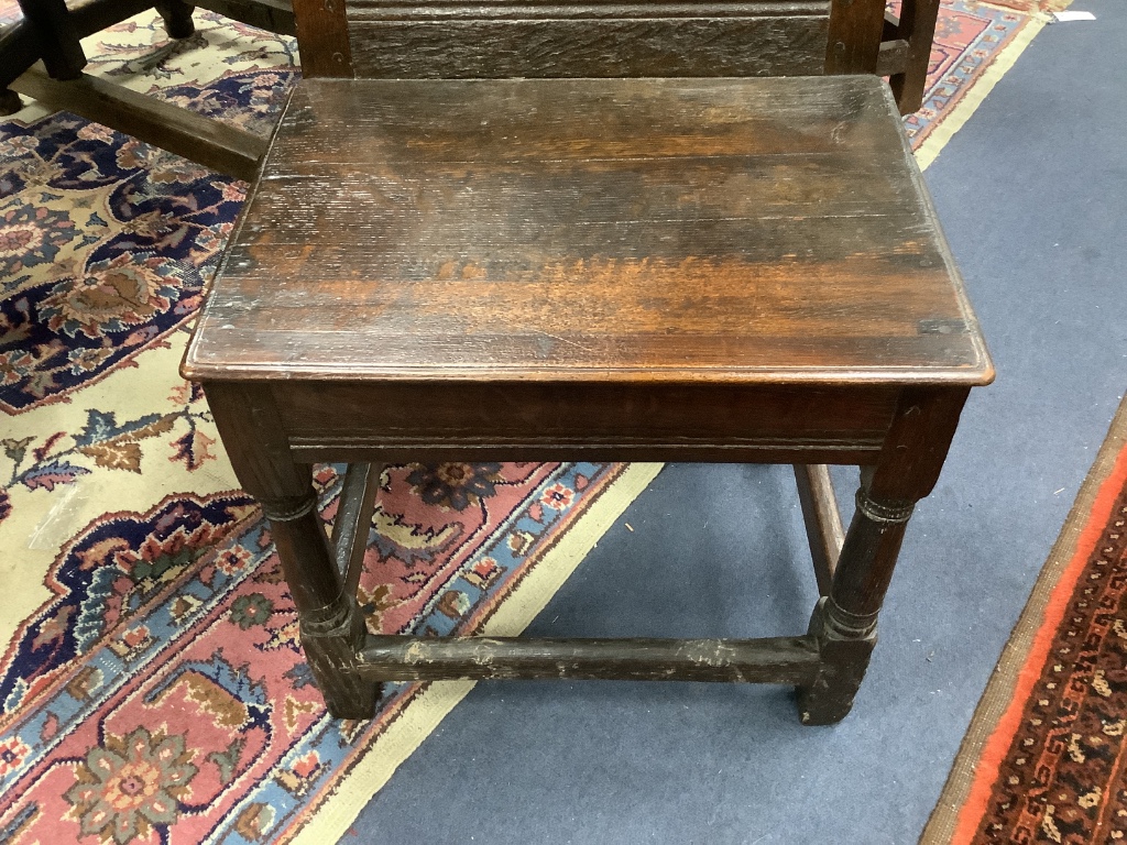 A 17th century oak back stool with lozenge carved decoration, width 48cm depth 49cm, height 99cm